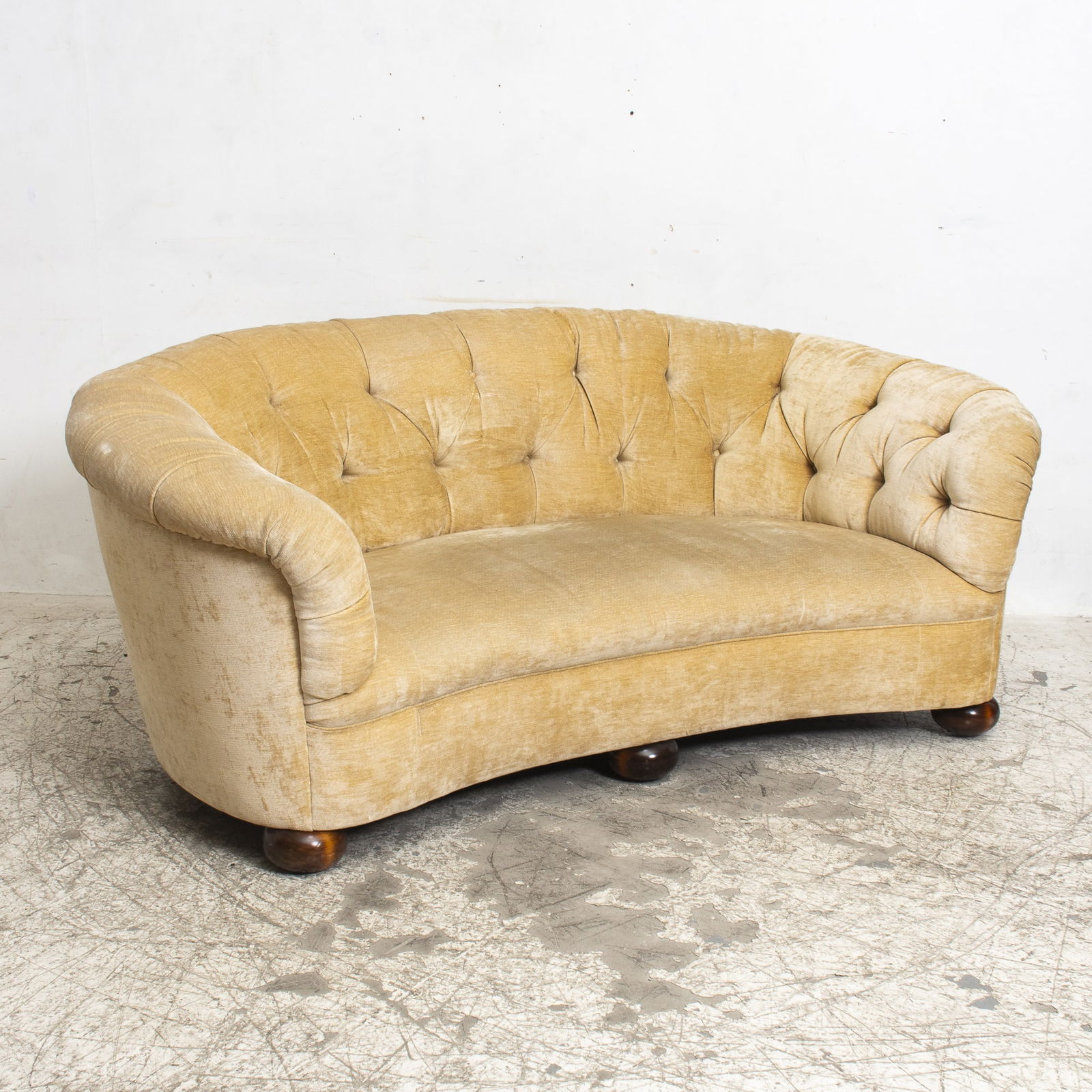 Tan Upholstered Rounded Sofa: 31" h x 73" w