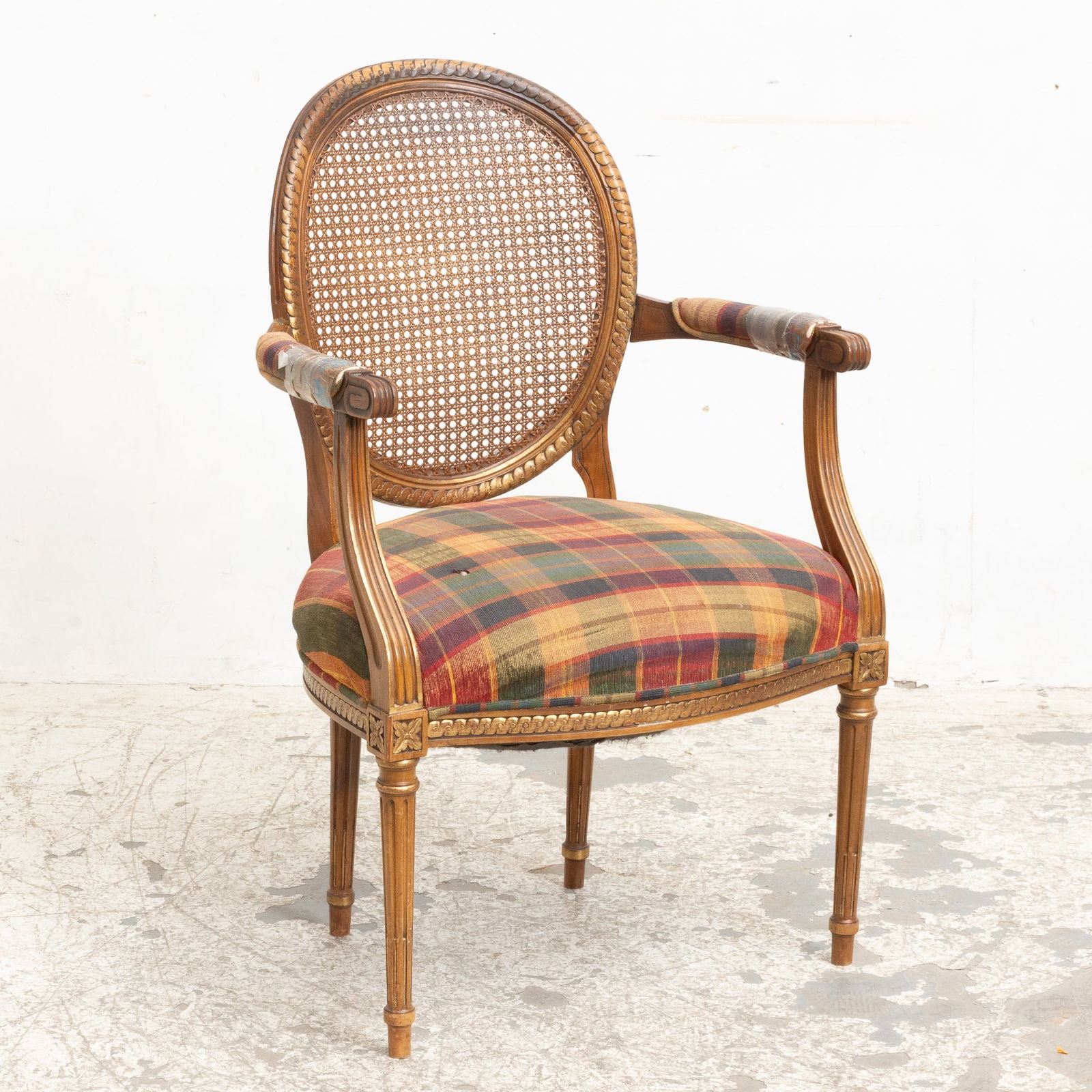 Caned Back Upholstered Armchair: * (36 1/2" h x 23" w x 19" d seat to floor 17" h) Tears, heavy wear to upholstery, scratches