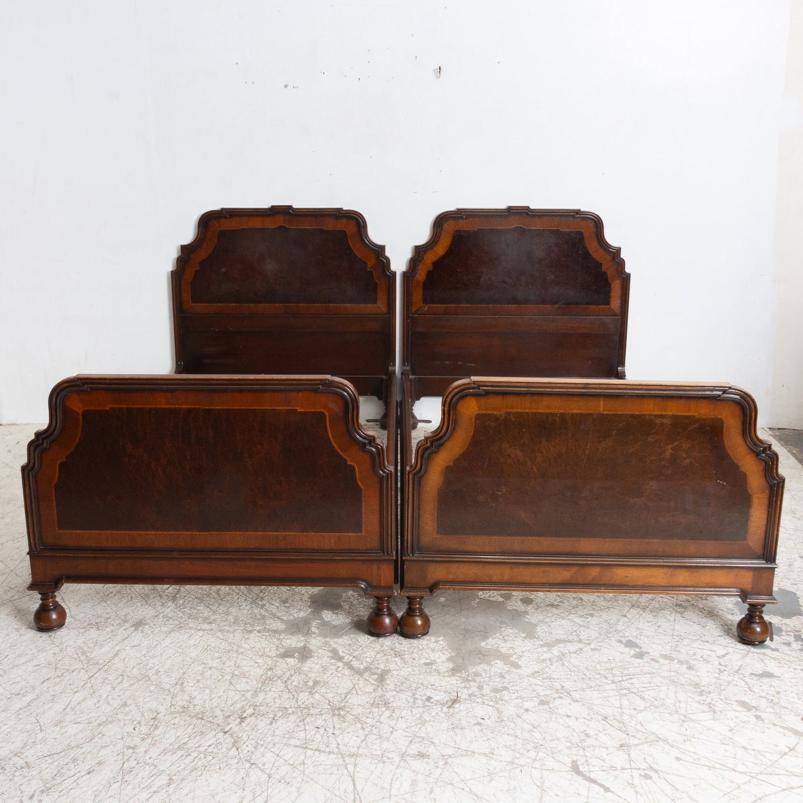 Pair of Queen Anne Style Inlaid Walnut Twin-Size Bedsteads: Each raised on bun feet. * Scratches and dings