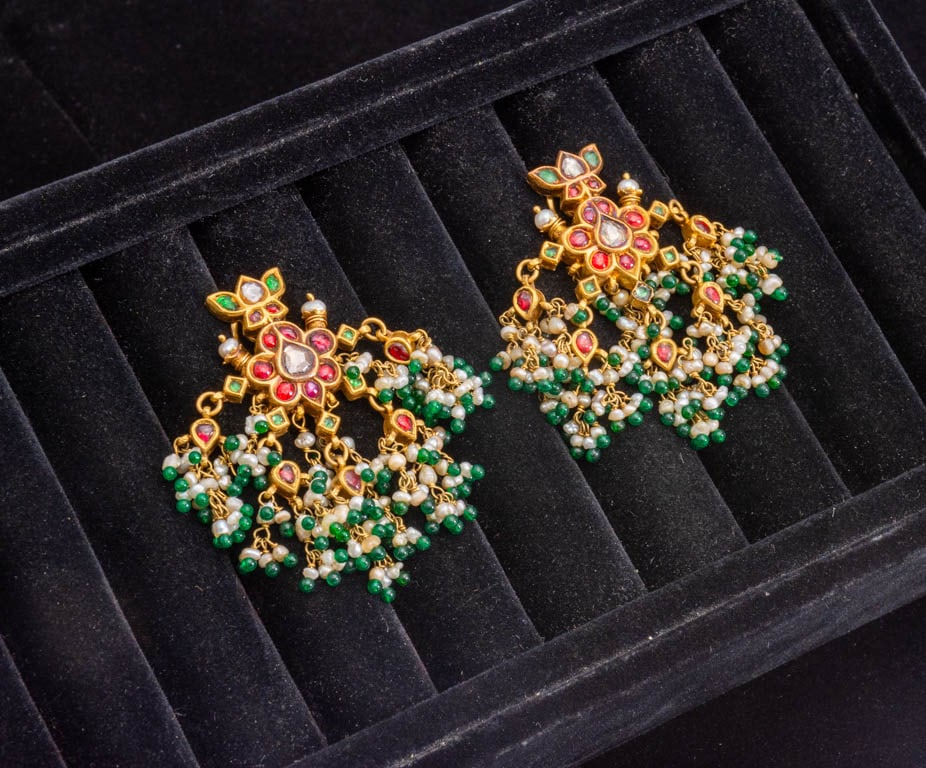 Pair of Indian Gold, Gem-Set and Freshwater Pearl Pendant-Earclips: Made up of foil-backed varishaped diamonds, red spinel, emeralds, small pearls, and glass beads Ap. 27.3 dwts * (2" x 1 1/4") Test 18kt, shellac-filled