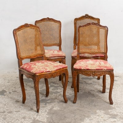 Set of Four Carved Mahogany Caned Back Side Chairs: With upholstered seating (35" h x 18 1/2" w x 16 1/2" d) Stains, scratches, cracks