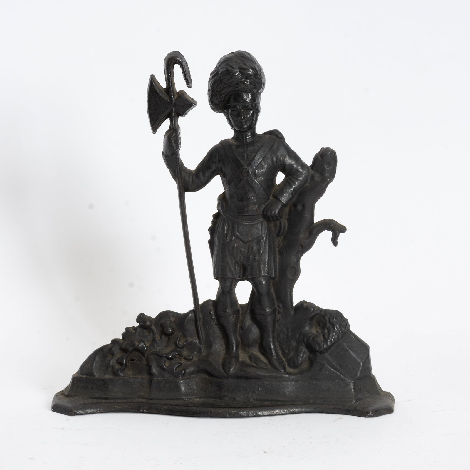 Cast Iron Figural Doorstop: Depicting a Highland solider 15" h x 14" w x 3" d
