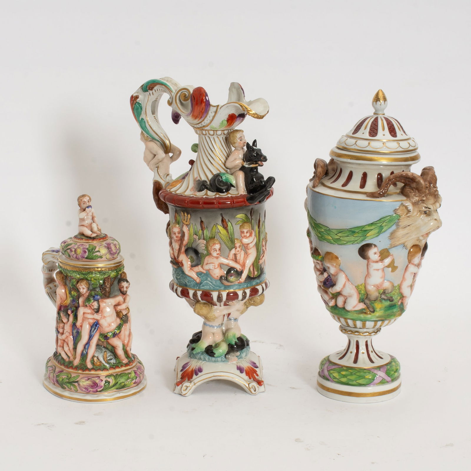 Group of Capodimonte Articles: Comprising a stein, ewer, and covered urn (Largest 14" h) Chip to one