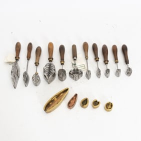 Group of Eleven Iron Silk Molds