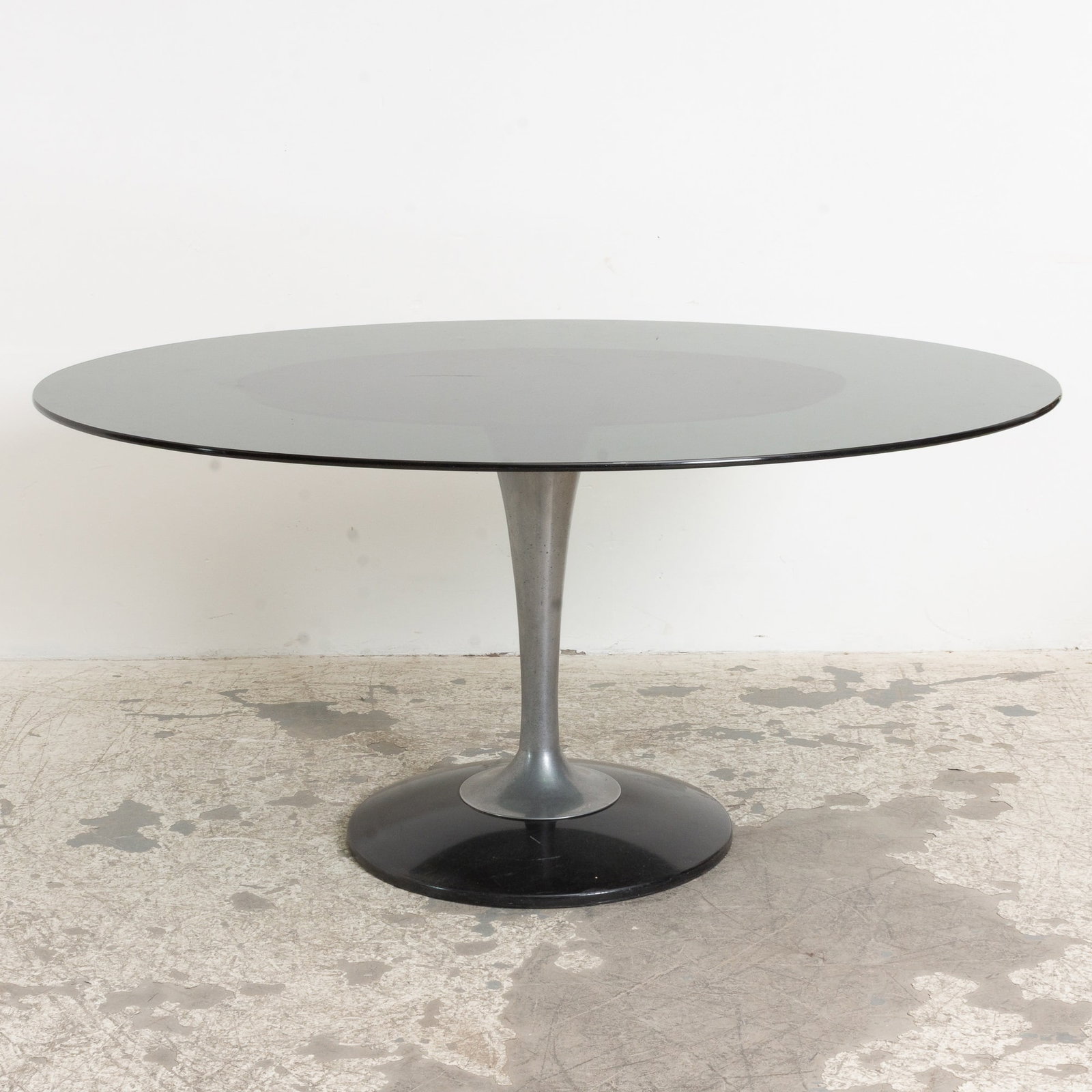 Saarinen Style Metal and Glass Oval Tulip Table: (28 3/4" h x 60" w x 46" d) Scratches