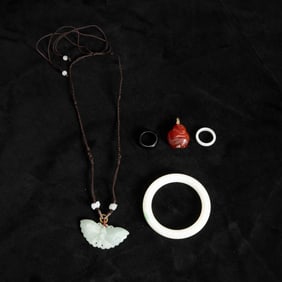 Group of Multicolored Carved Jade and Agate Jewelry