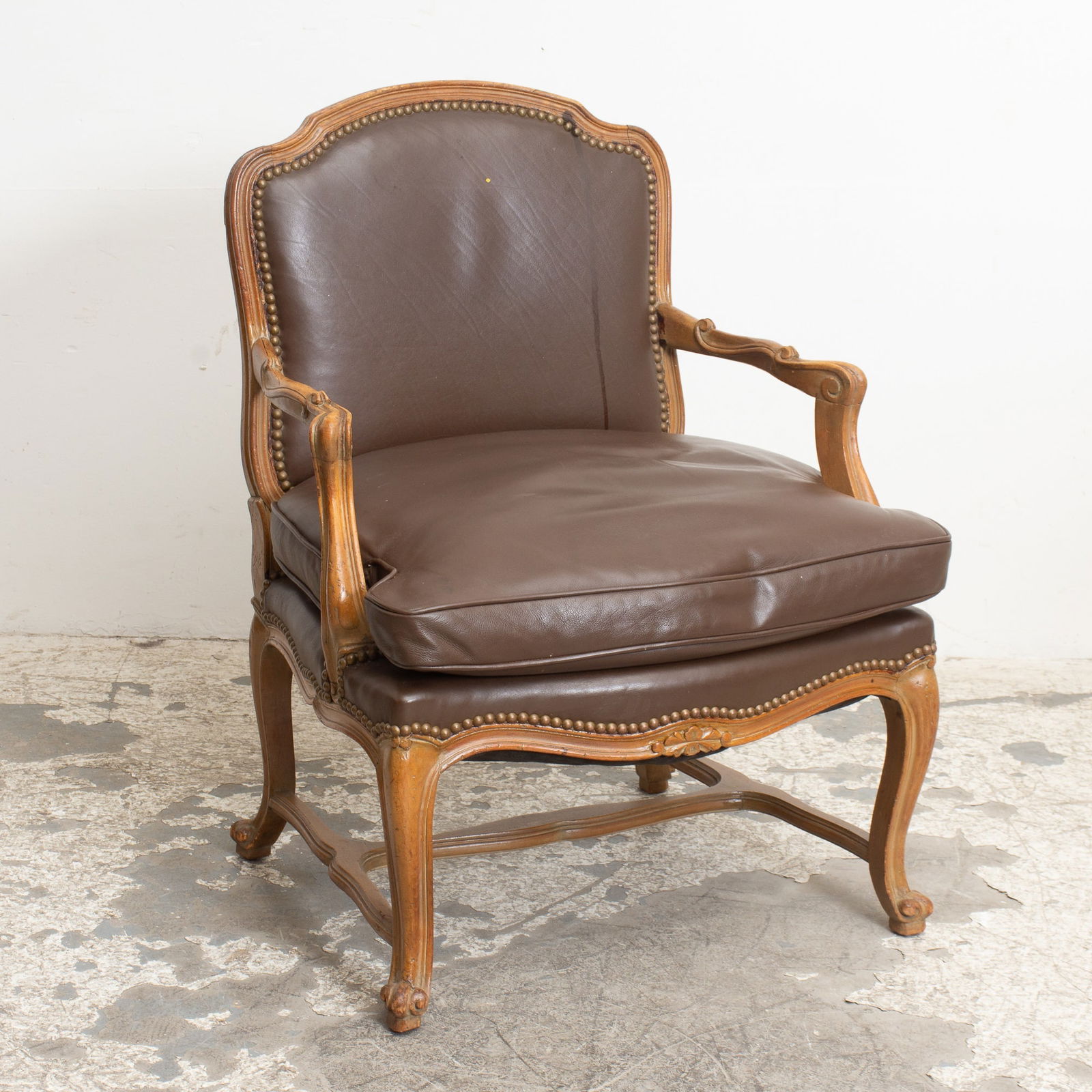 Louis XVI Style Leather Upholstered Armchair: . (34" h x 26" w x 20" d Seat to floor 17" h) Stains, scratches and dings