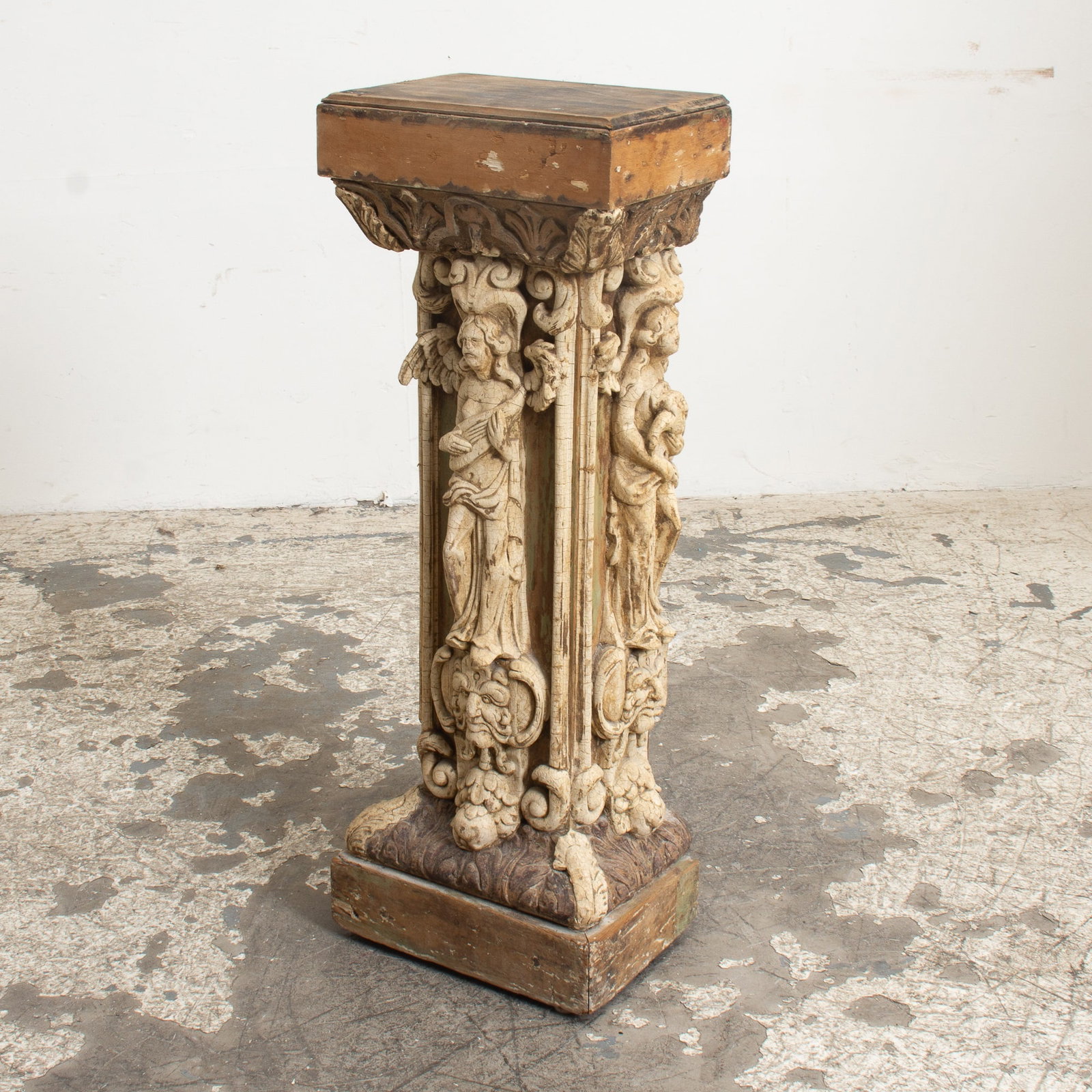 Baroque Style Carved Wood Painted Three-Sided Pedestal: . (38" h x 14" w x 10" d) Loss to paint, chips