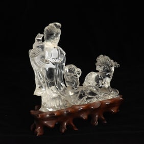 A Chinese Rock Crystal Carving of a Guanyin and a Beast