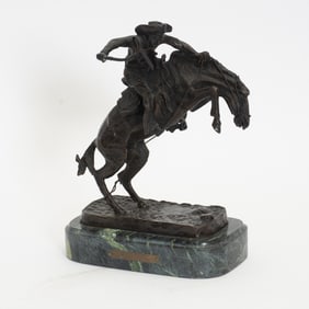 After Remington Patinated Bronze Statue
