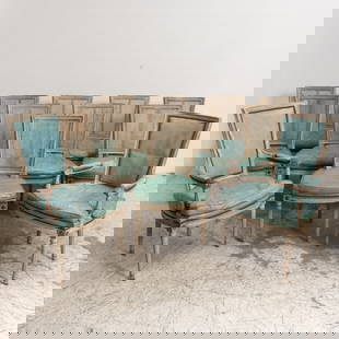 Set of Twelve Louis XVI Style White Painted Dining Chairs: With cane backing and leather upholstered seating Two armchairs, ten side chairs (Armchairs 37 1/2" h x 24" w x 19" d Seat to floor 19" h) Tears and heavy wear to upholstery, scratch