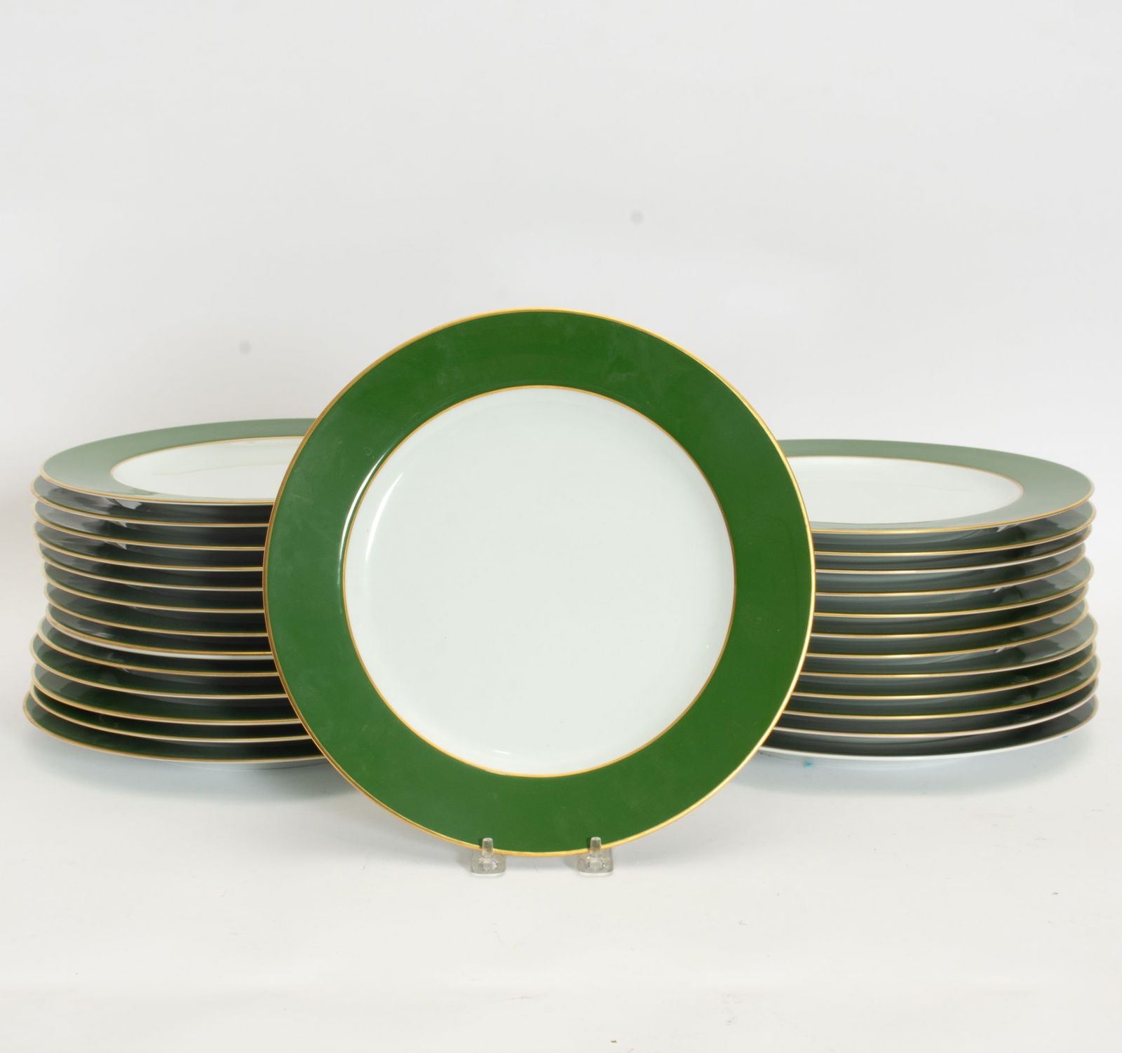 Set of Bernardaud Limoges Green and Gilt Rimmed Porcelain Dinner Plates: Approx. 24, together with two additonal Bernadaud plates of a slightly different green hue. Please see Condition Photos. (11 3/4" dia) Good