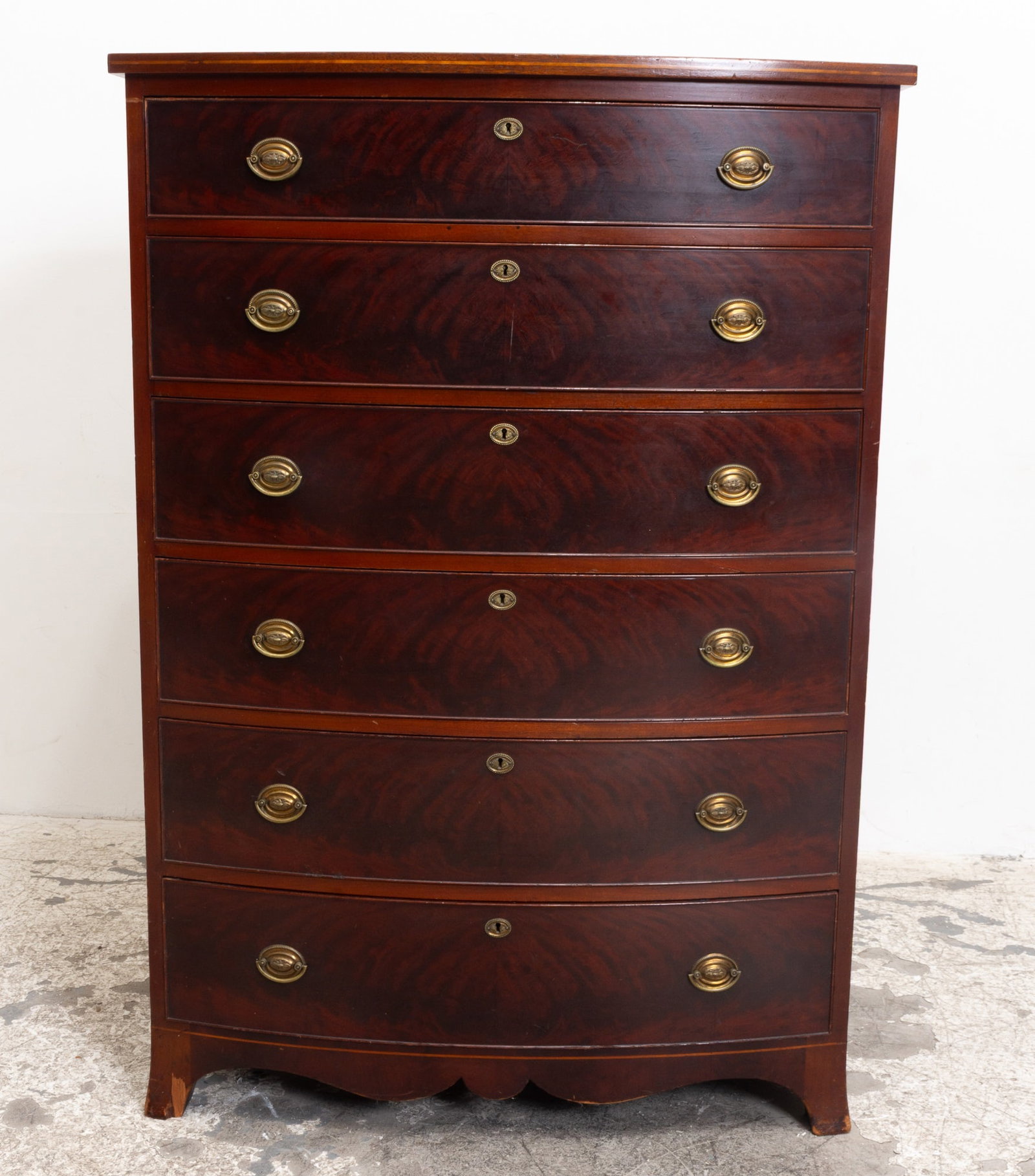 Mahogany Inlaid Tallboy: . (54" h x 37 1/2" w x 24" d) chips and loss to veneer on legs, cracks to inlaid, scratches and dings