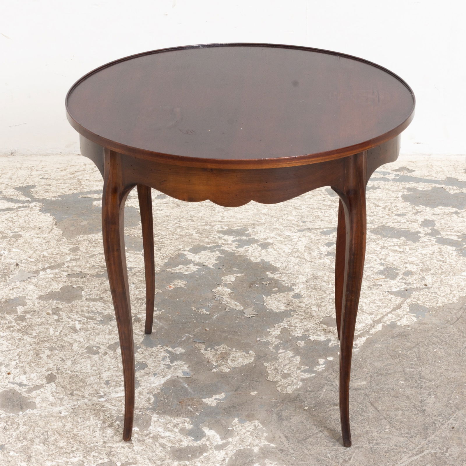 Mahogany Tea Table: . (23" h x 24" dia) Scratches and dings, water marks