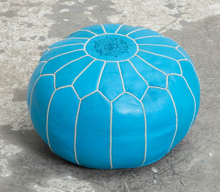 Blue Leather Upholstered Bohemian Poof: . (14" h x 21" dia) Minor wear to leather