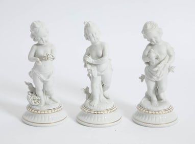 Group of Three Bisque Porcelain Putti Figures