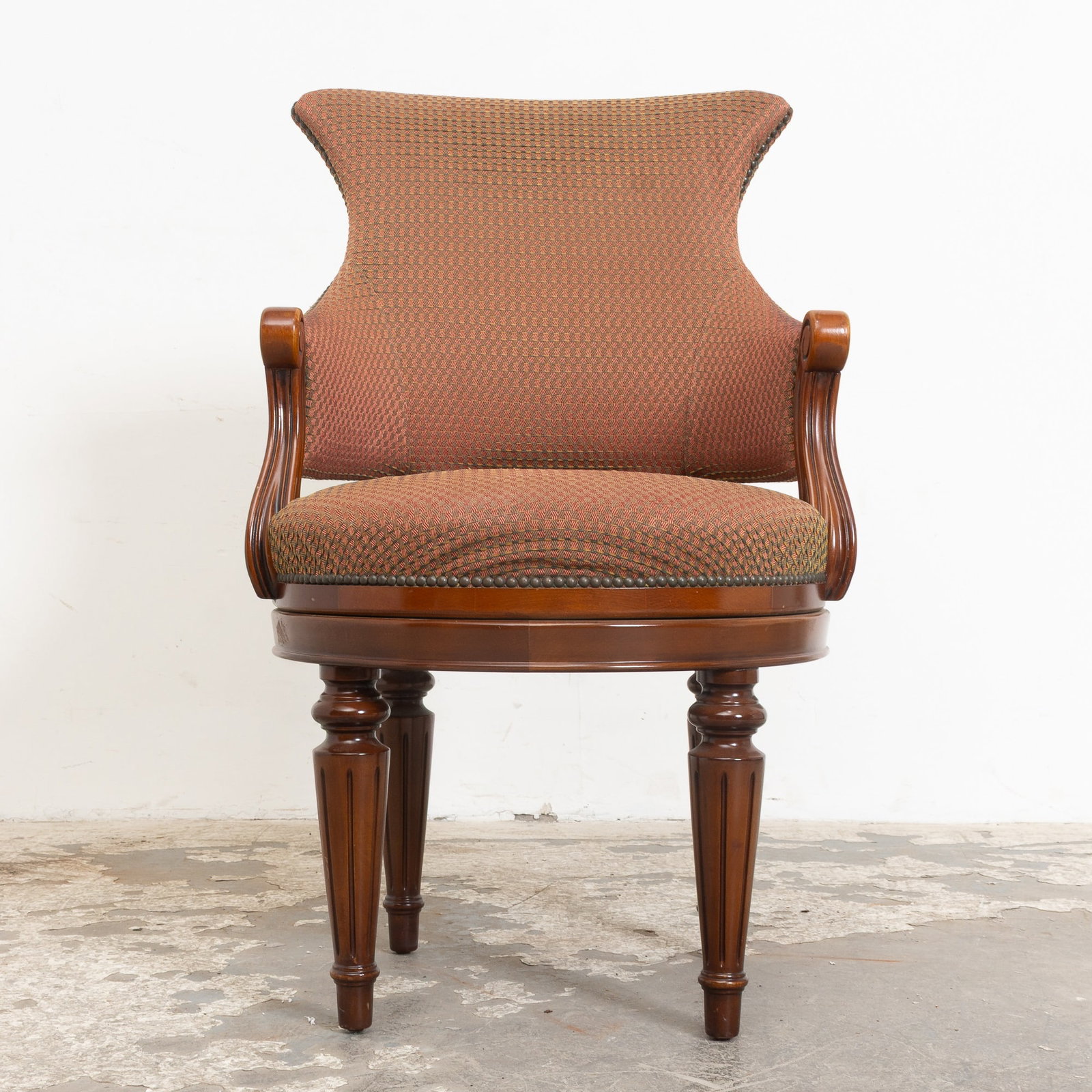Upholstered Mahogany Swivel Chair: Made by Hurtado of Spain (37" h x 22" w x 20" d Seat to floor 19" h) stains, fading, scratches to legs