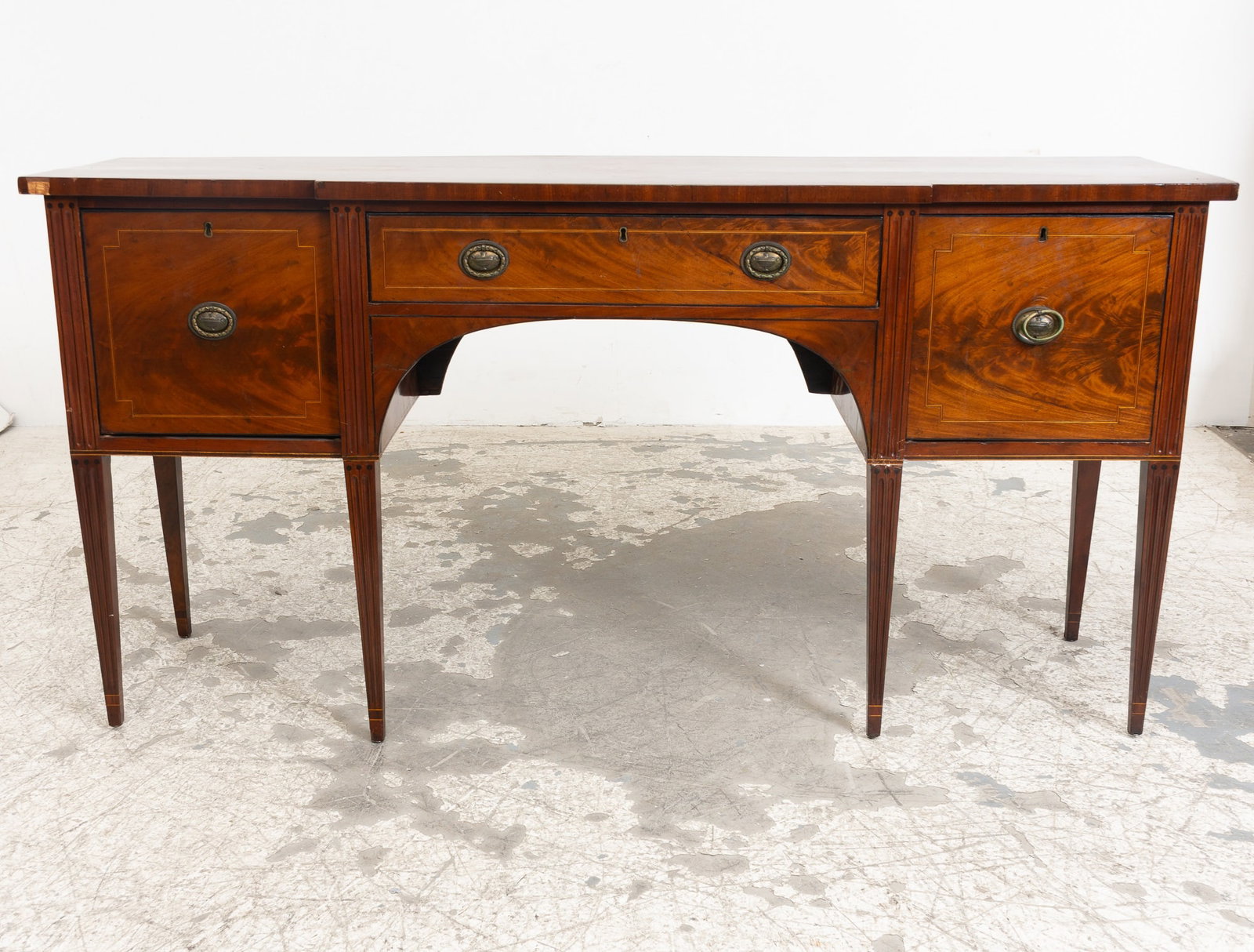 Georgian Style Mahogany Sideboard: . (36 3/8" h x 70" w x 19 1/4" d) Scratches and dings, old repair to center front legs