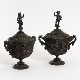 Pair of Bronze Figural Urns