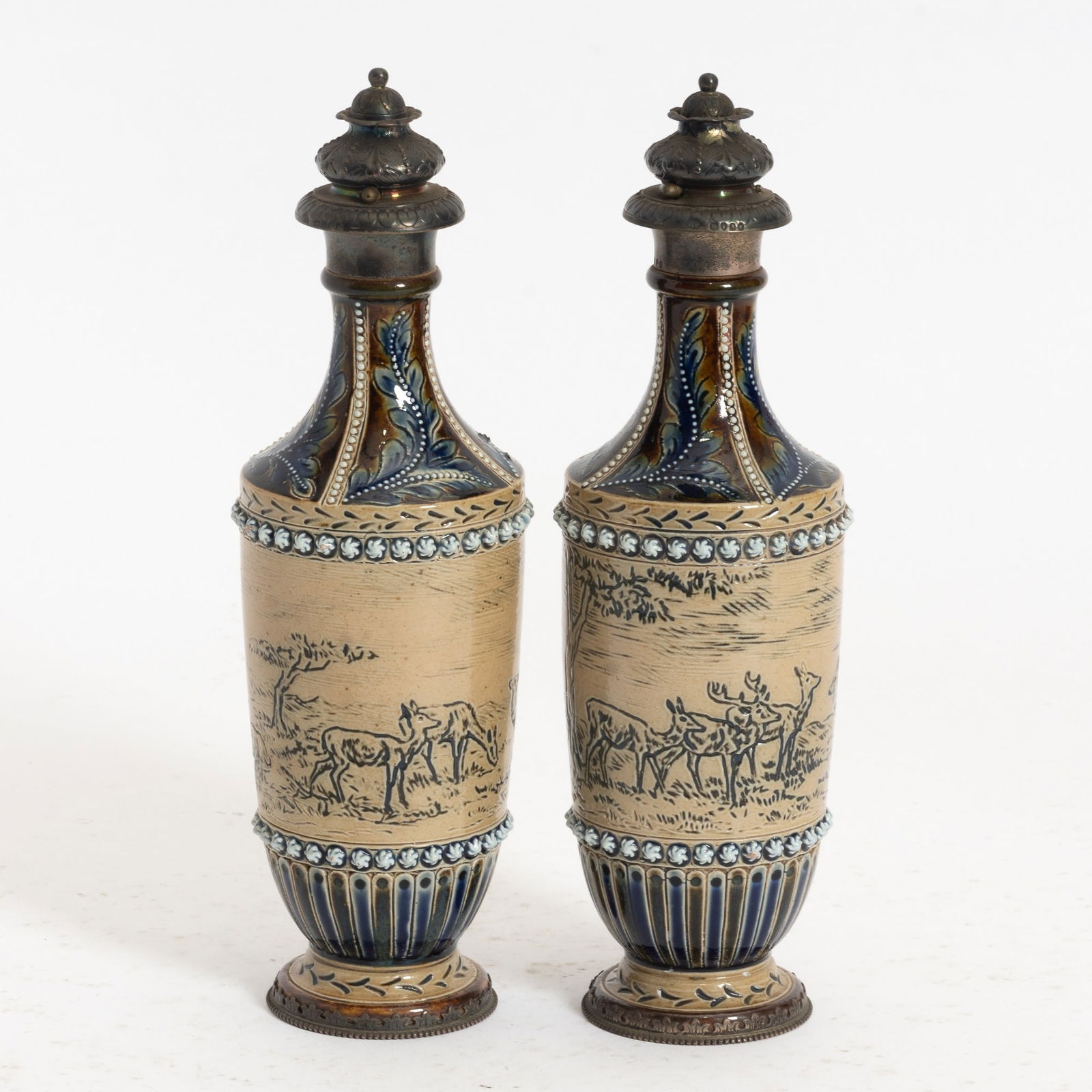 Pair of Signed Doulton Lambeth Scent Flasks: with silver toppers and base (9 1/2" h x) Good