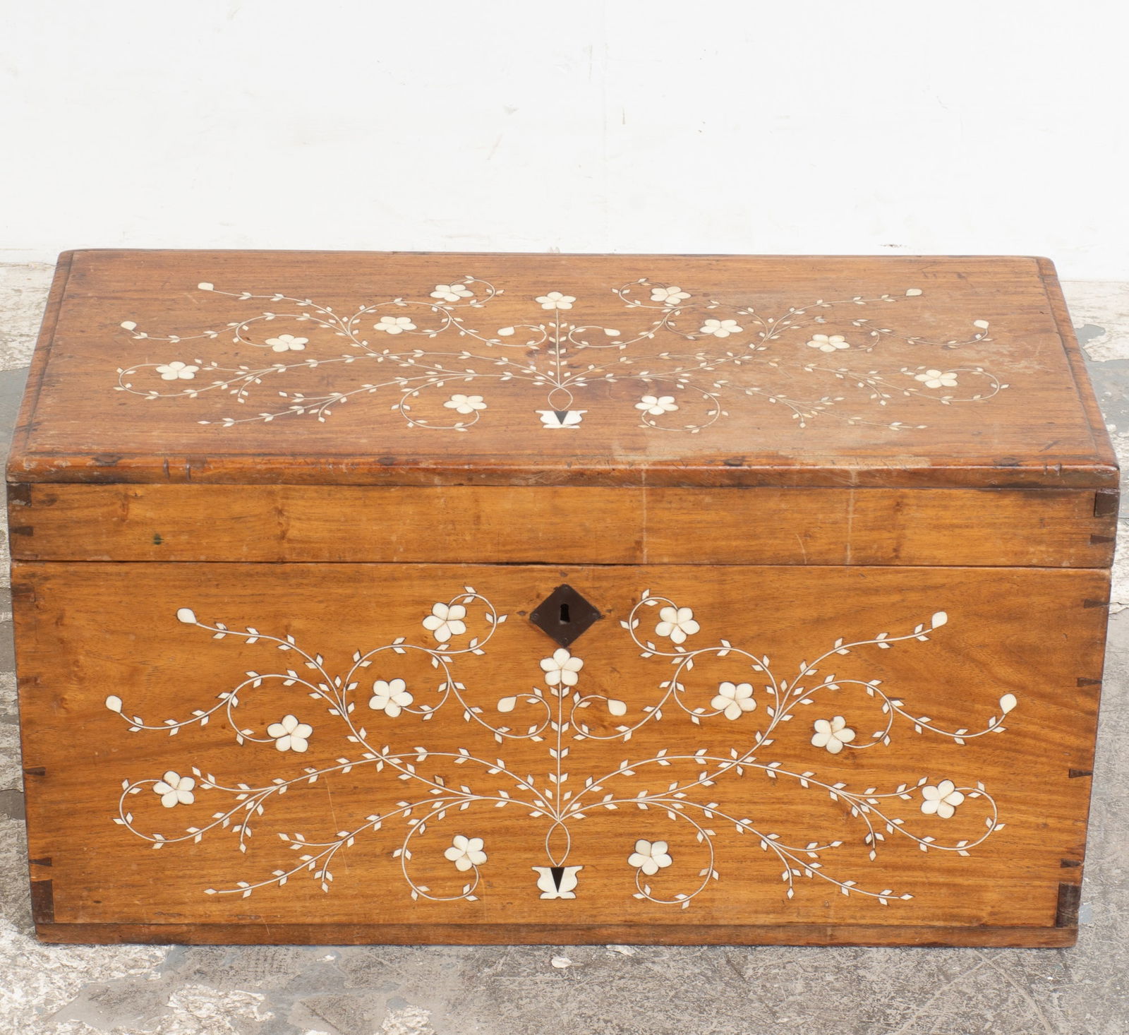 Continental Bone-Inlaid Walnut Chest: . (15 1/2" h x 30 1/4" w x 14 1/2" d) Scratches and dings, staining to top, some cracks in inlaid shell