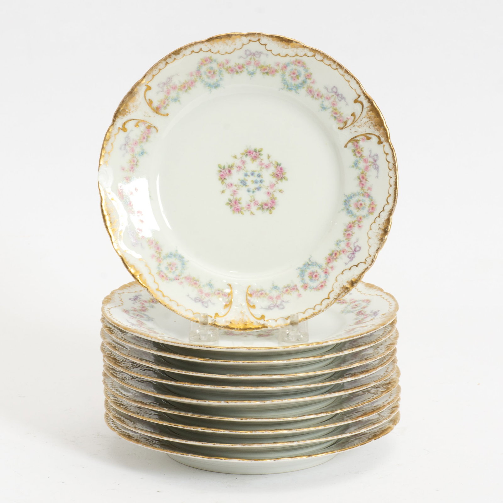 Set of Limoges Porcelain Plates: . (7 1/2" dia) Scratches and dings