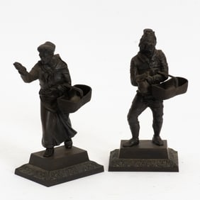 Two Cast Iron Figures