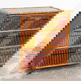 Painted Bamboo Faux Bookshelf Dresser: . (32 1/2" h x 30 1/2" w x 17 1/2" d) Scratches and dings, crack