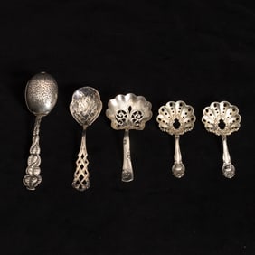 Group of Four Assorted Sterling Silver Spoons and Strainers