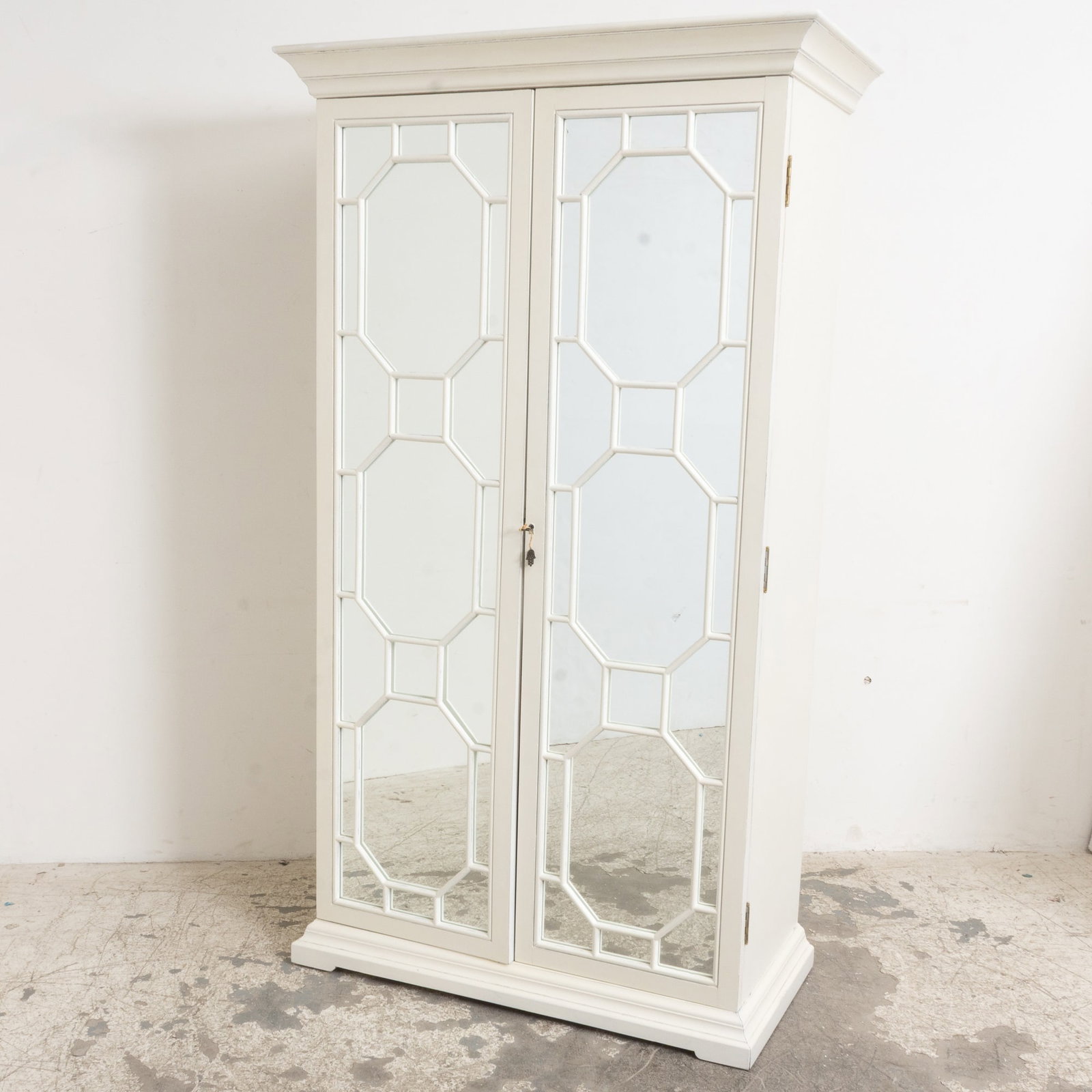 White Painted Mirrored Armoire: . (84" h x 42" w x 23 1/2" d) Scratches, missing bottom shelves