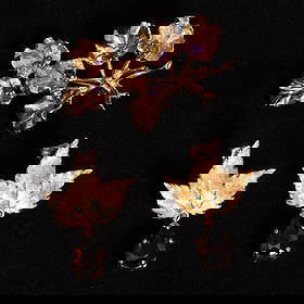 Gold and Amethyst Leaf Brooch and Pair of Garnet Earrings: 14 kt. 2 pear-shaped garnets ap. 3.70 cts., 6 round amethysts ap. .40 ct. Ap. 9 dwts. (Brooch: 1 5/8" x 1 1/8" ; Pendant-earrings: 1 3/16" x 7/8") Garnets: deep reddish-brown, slightly included.