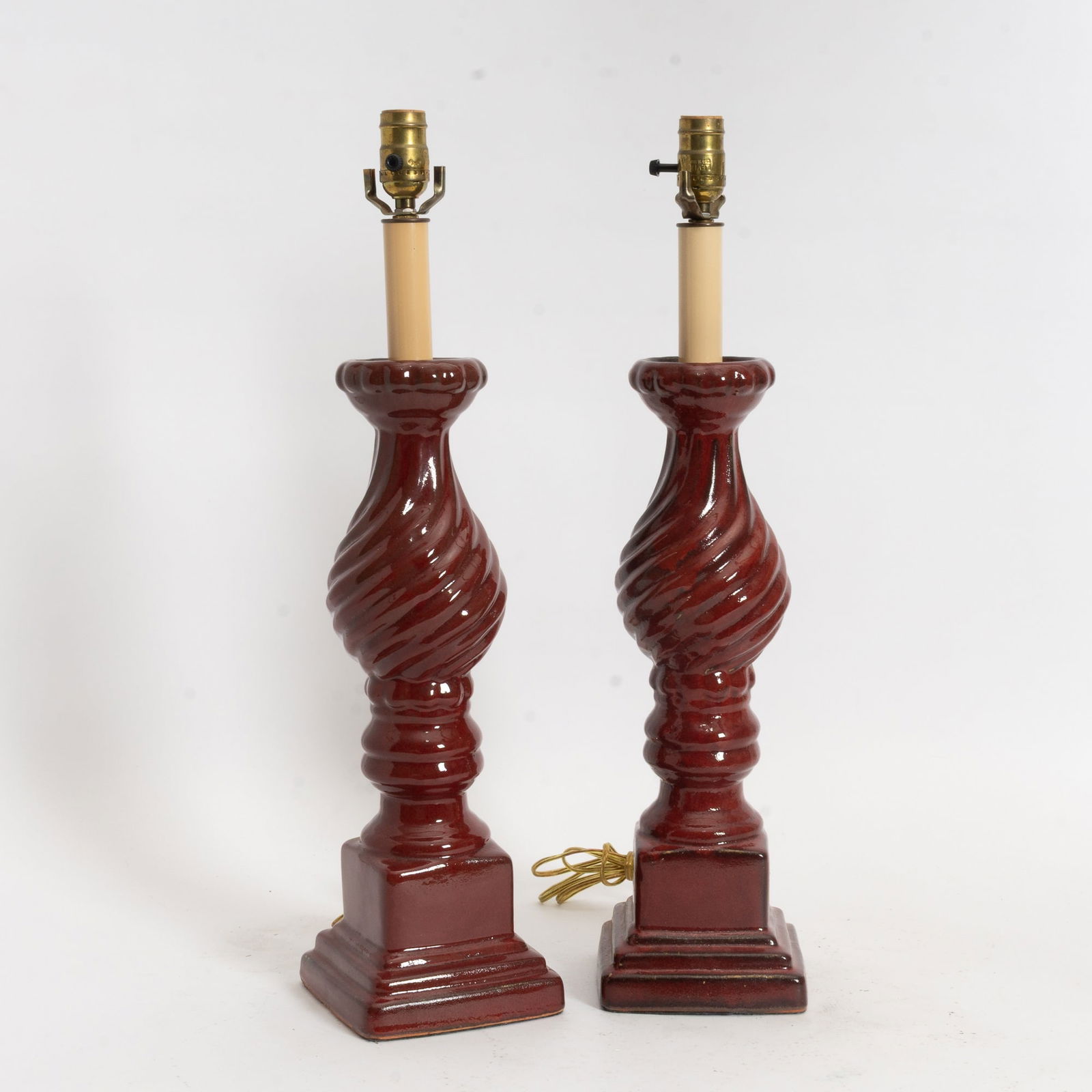 Burgundy Glazed Ceramic Baluster-Form Swirled Candleholders: Mounted as lamps (26" h) Chips, untested