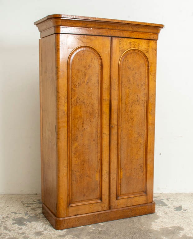 Louis Philippe Walnut and Burl Walnut Armoire: Second quarter 19th century Cornice and base detach (83" h x 52" w x 23" d) Sunfaded, age cracks, alterations to cornice, back and interior