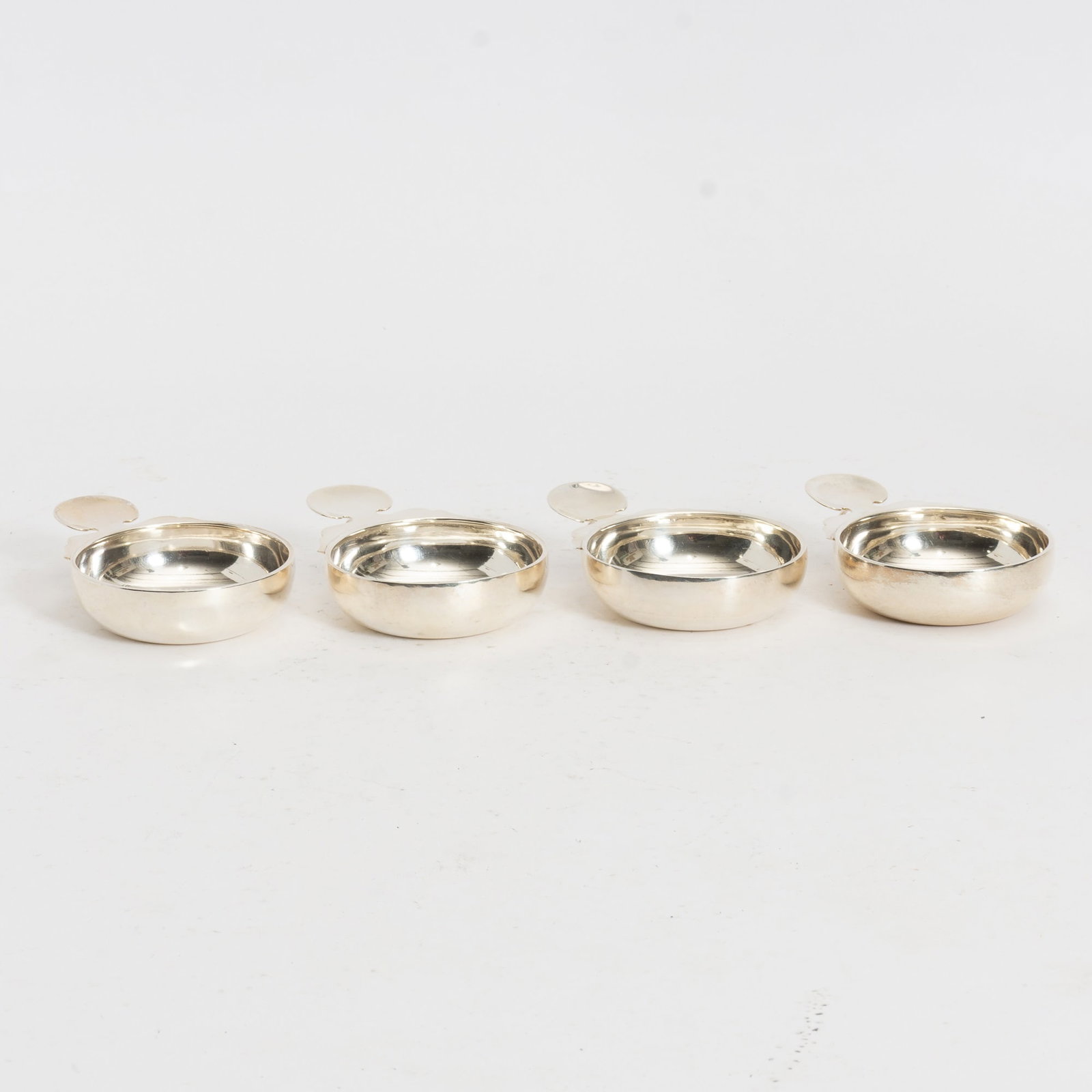 Set of Four Sterling Wine Tasters: 12.4 ounces (1" h x 4 3/4" w from handle x 3 1/2" dia)