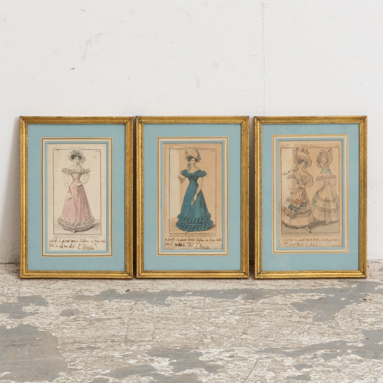 Three Fashion Prints: From Costume ParisienLithographs (Sight 7 3/4" h x 4 1/4" w Overall 12" x 8 3/8")Staining