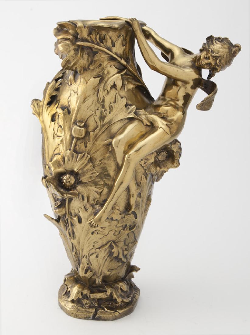 Art Nouveau gilt bronze figural vase: Art Nouveau gilt bronze figural vase decorated with a winged female nude figure and heavy florals, signed "Francois & Louis Moreau". 19.125"H x 11.5"W x 7"D, Circa - 1900. PROVENANCE: Property from th
