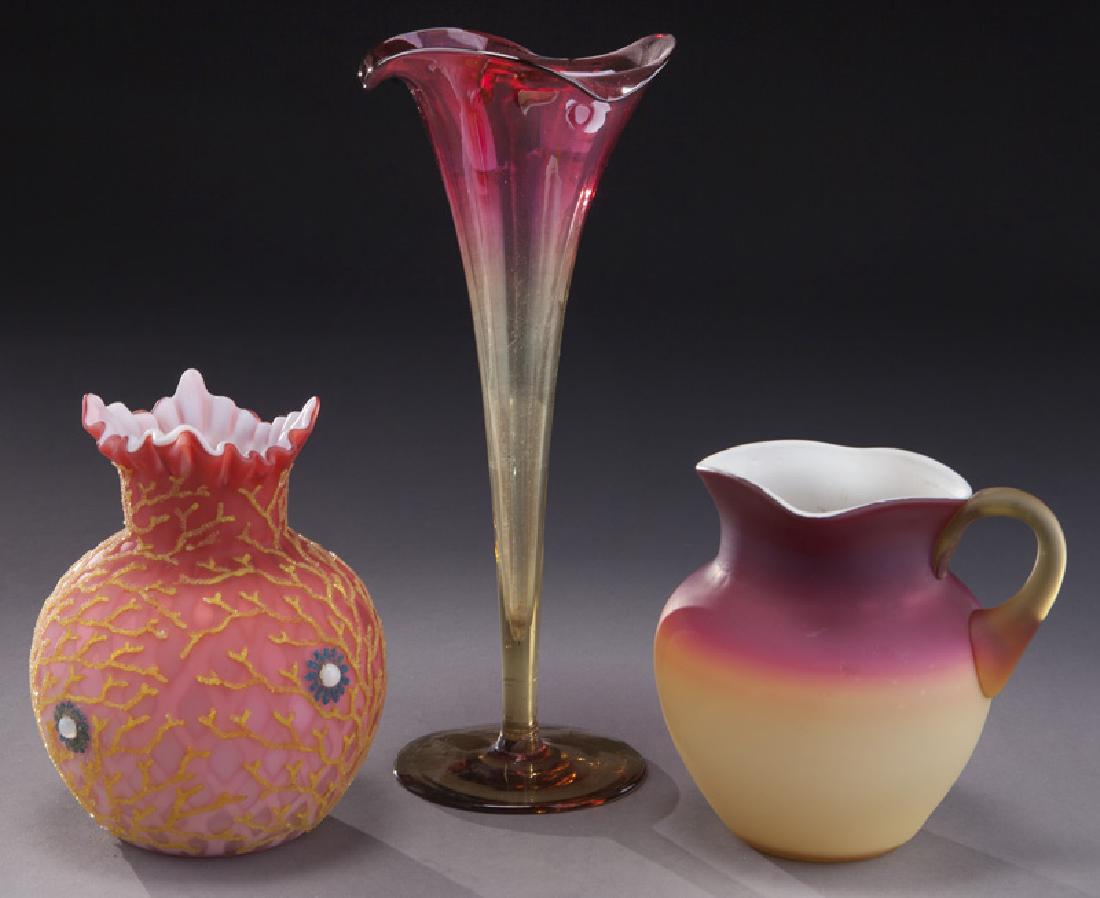 (3) Art Victorian art glass vases: (3) Art Victorian art glass vases comprising: (1) Libby amberina, 9.75"H; (1) marked Webb coraline vase with applied floral and vine decoration, marked to underside, "Webb Patent"; (1) Wheeling Peach 