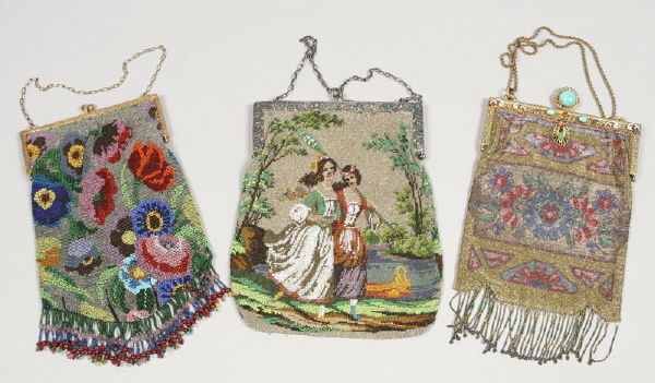 3 Pcs. Fine vintage beaded purses: 3 Pcs. Fine vintage beaded purses including: (1) silver background with large colorful flowers, having a gilt metal frame and clasp with sapphire colored cabochon. The bottom bordered with heavily bea