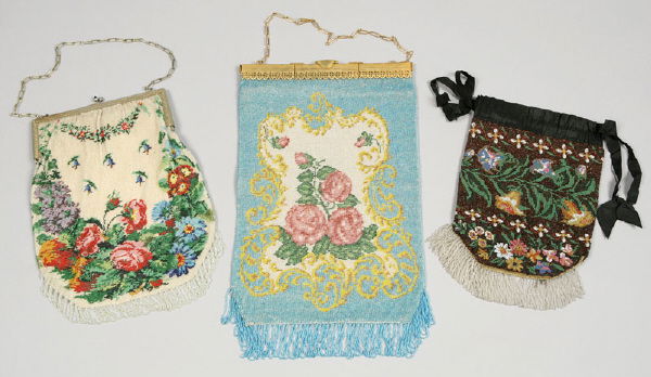 3 Pcs. Fine vintage beaded purses: 3 Pcs. Fine vintage beaded purses including: (1) opalescent eggshell background with floral and swag decoration, having a silver frame, the clasp finished in sapphire colored cabochons.Intertwined tas