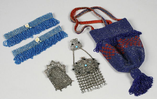 5 Pcs. Vintage beaded ladies purses and: 5 Pcs. Vintage beaded ladies purses and accessories including: (2) light blue seed beaded garter belts with applied white cloth flowers; (1) miniature woven metal sterling silver purse with a frame de