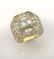 18K gold and diamond ring featuring a central
