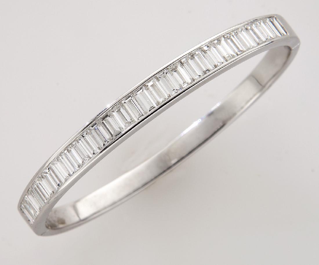 18K gold and baguette cut diamond bangle bracelet. (1 of 2)