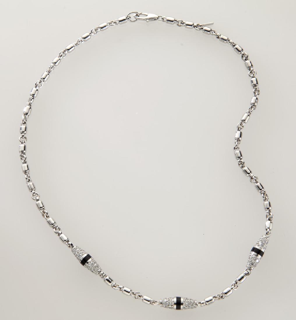 Platinum, 18K gold and diamond necklace. (1 of 2)