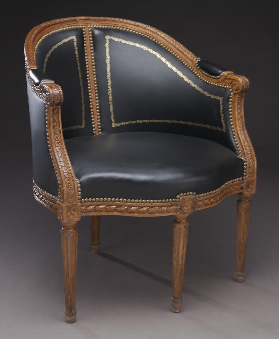 French leather bureau chair,: French leather bureau chair, the curved back with gilt detail over serpentine seat joined by guilloche carved arms and raised on tapered fluted legs. 32"H x 25.75"W x 21.5"D, Late 19th C. CONDITION: W
