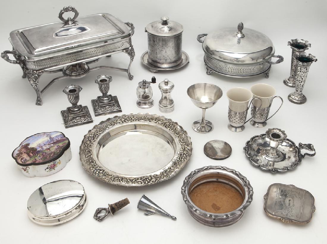 Group of silverplate table articles,: Group of silverplate table articles, comprising: (2) circular bowls; (1) lid; (1) circular compact mirror; (1) stem; (2) candlesticks; (2) bud vases with glass inserts; (1) salt; (1) pepper; (1) wine 