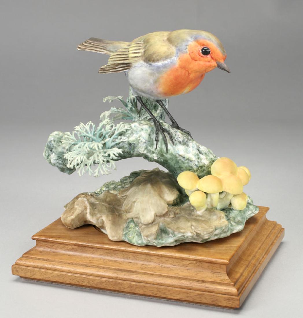 Dorothy Doughty porcelain bird, Robin Erythacus: Dorothy Doughty porcelain bird, Robin Erythacus Rubecula, on stand, bearing the black Royal Worcester mark, "England," stamp for 1964 and copyright 1964, and signed by est. of D Doughty. No box. 7"H, 