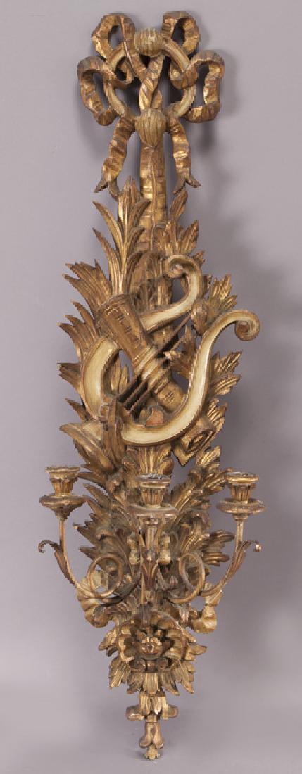 Gilt carved wall sconce with leaf, lyre-form, and (1 of 6)