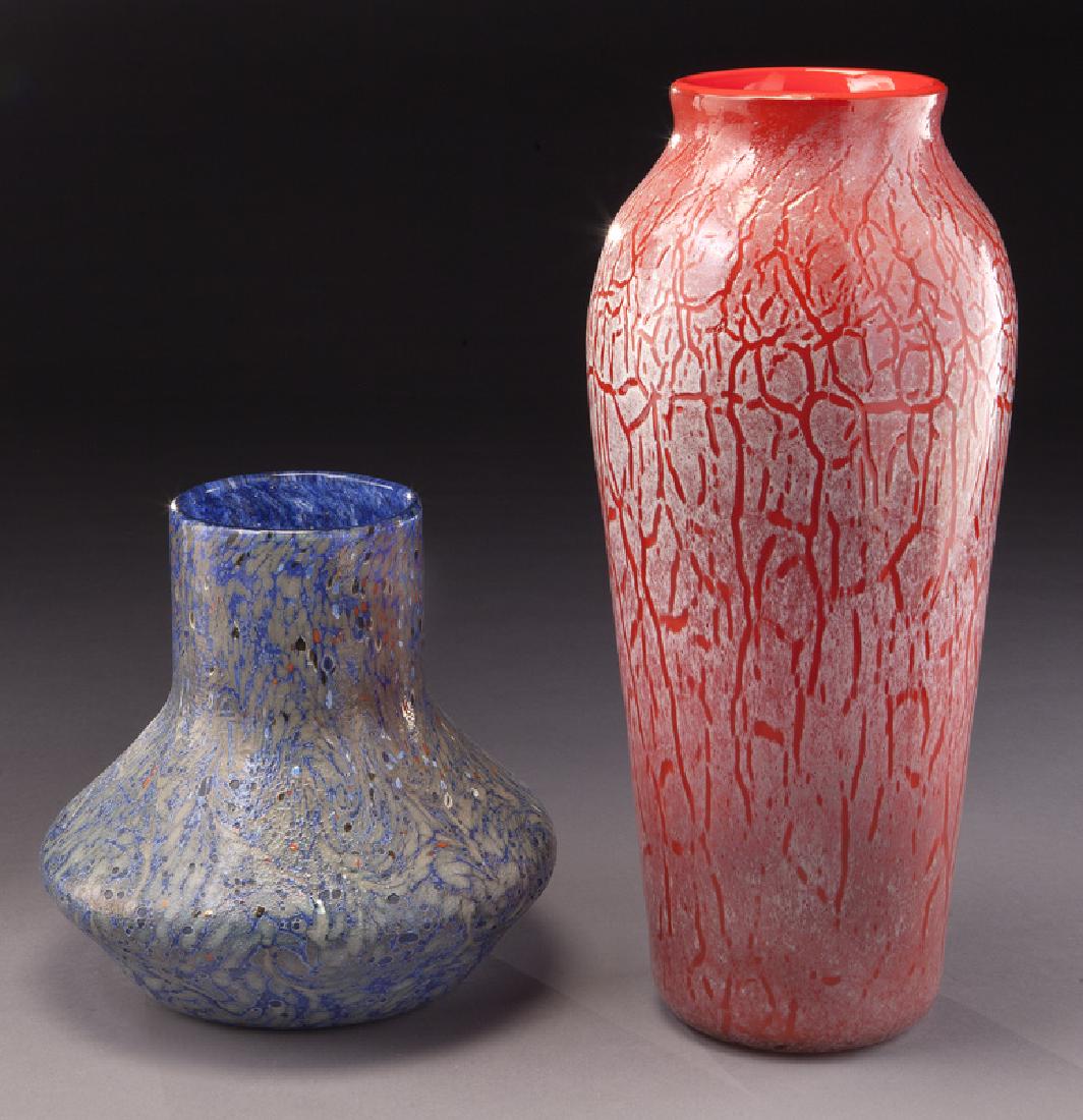 (2) Monart modeled glass vases: (2) Monart modeled glass vases in red and blue. Taller: 15"H, Circa - 1920. PROVENANCE: From the Estate of John W. Lolley, Monroe, Louisiana.