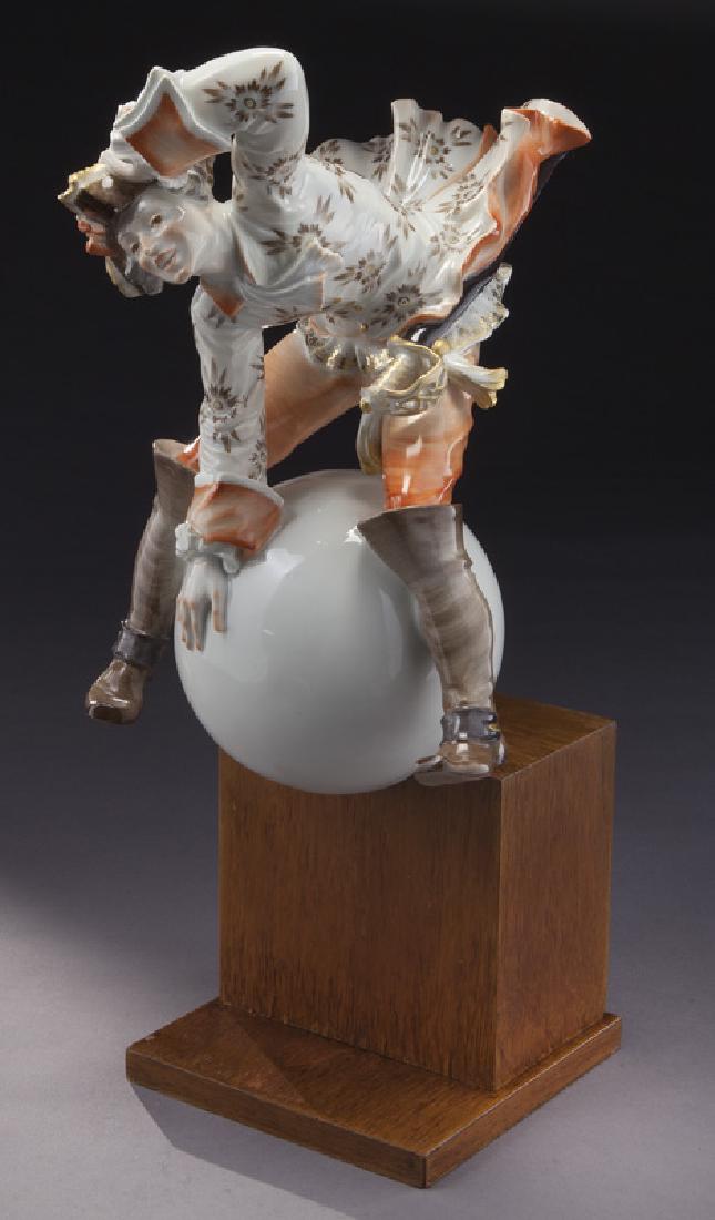 Meissen porcelain figure "Baron Munchhausen",: Meissen porcelain figure "Baron Munchhausen", by Alexander Struck c. 1941, with blue crossed swords mark and mounted on a stepped wooden base. Figure: 11"H x 7"W x 8"D; overall: 15.7"H, Circa - 1941.