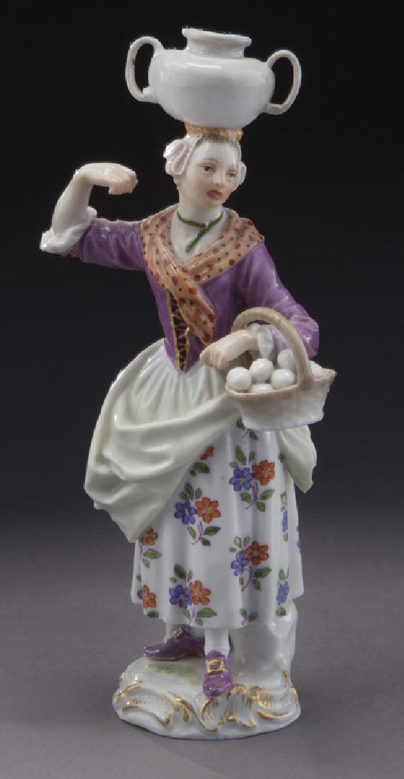 Meissen porcelain figure "Egg Seller": Meissen porcelain figure "Egg Seller" based on a model by P. Reincle c. 1757, with blue crossed swords mark. 6.25"H, Circa - 1900.